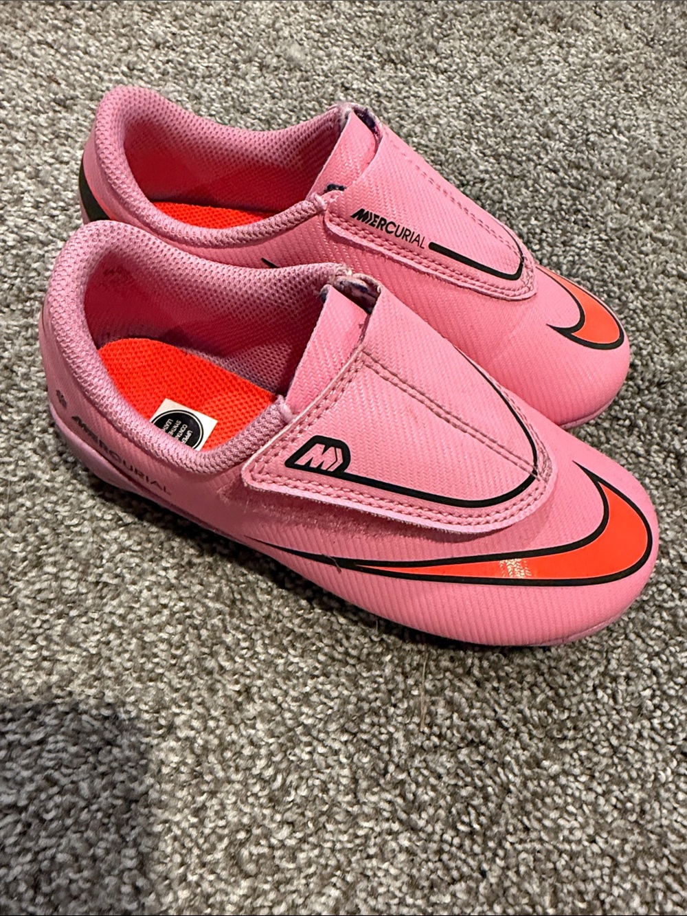 Nike Kids' Pink Mercurial Soccer Shoes with Orange Swoosh